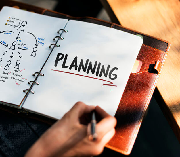 woman writing planning business